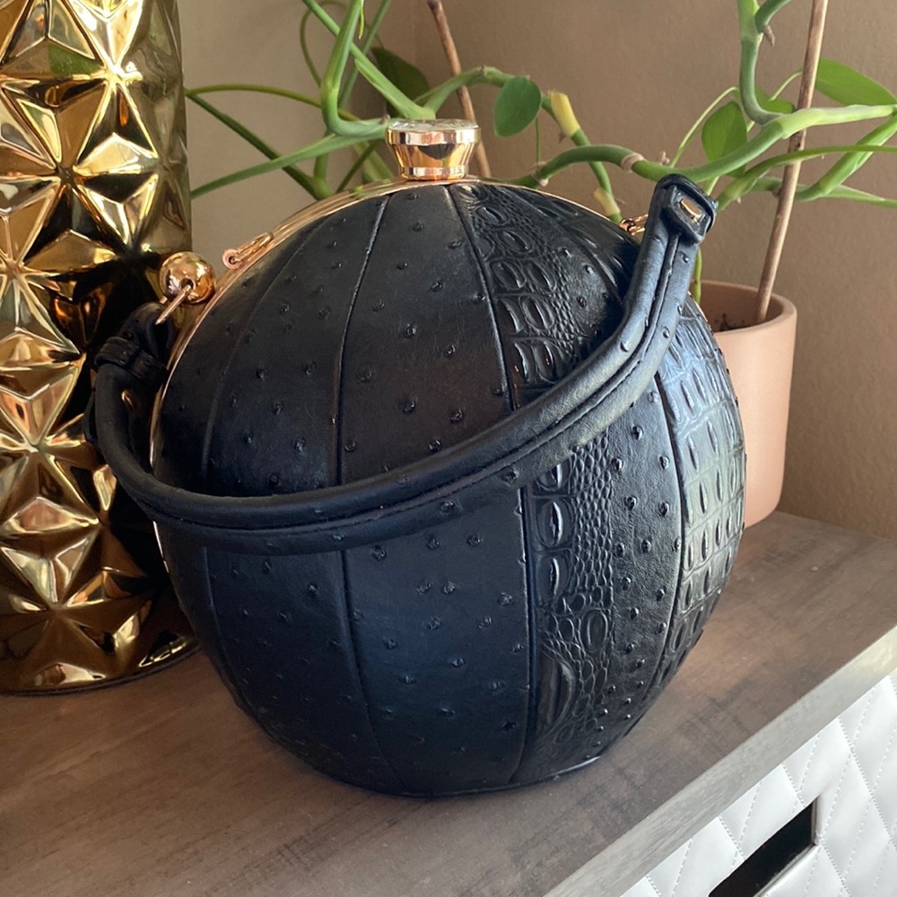 Unique boutique black vegan ostrich ball bag.